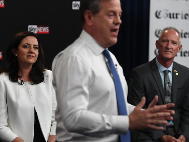 Queensland Premier Annastacia Palaszczuk (left), Leader of the Opposition Tim Nicholls (centre) and One Nation's Steve Dickson are seen during a televised leaders debate 'The People's Forum' at the Broncos Leagues Club, Brisbane, Thursday, November 16, 2017. Queenslanders will go to the polls on November 25. (AAP Image/Dan Peled) NO ARCHIVING