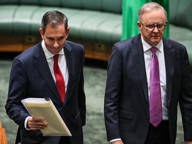 CANBERRA, AUSTRALIA - MAY 14: AustraliaÃ¢â¬â¢s Treasurer Jim Chalmers (L) and Prime Minister Anthony Albanese arrive before Chalmers delivers his budget speech at Parliament House on May 14, 2024 in Canberra, Australia. Australia's Labor government is grappling with a slowing economy, weaker commodity prices, soaring housing costs and a softening labor market as it prepares to unveil its federal budget on May 14. To counter these headwinds, the budget is expected to feature smaller revenue upgrades compared to recent years, while outlining the government's interventionist policies aimed at boosting domestic manufacturing and the transition to green energy. Critics warn that such industrial policies risk fueling inflation and diverting resources from more productive sectors of the economy. The budget is seen as a key opportunity for the Labor government to deliver broad economic support that analysts say is fundamental to re-election chances next year. (Photo by Tracey Nearmy/Getty Images)