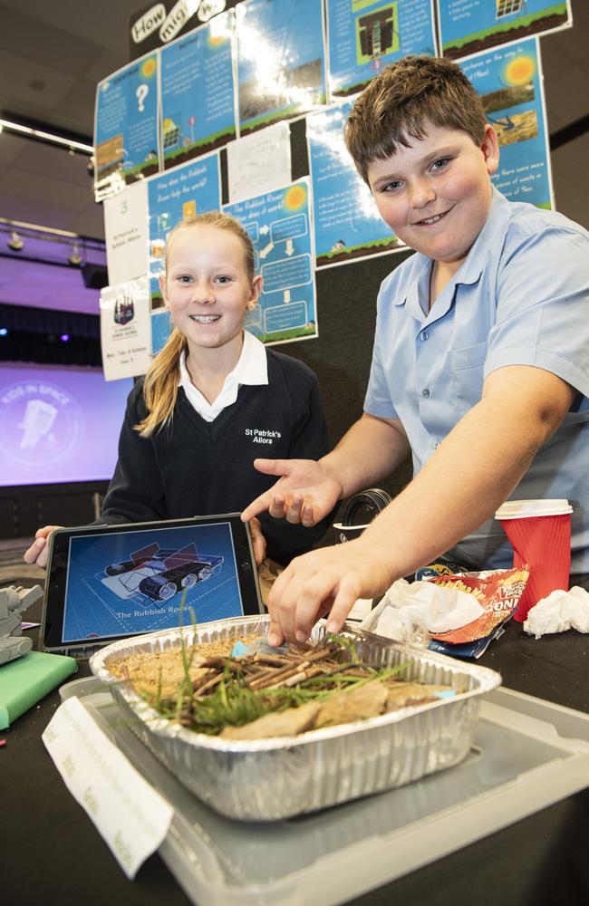 St Patrick's Allora students Katelyn Peters and Toby Schmidt with a project showing how to stop pollution around Allora as part of Kids in Space Queensland finals and showcase at Edmund Rice Cultural Centre St Mary's College, Friday, June 7, 2024. Picture: Kevin Farmer