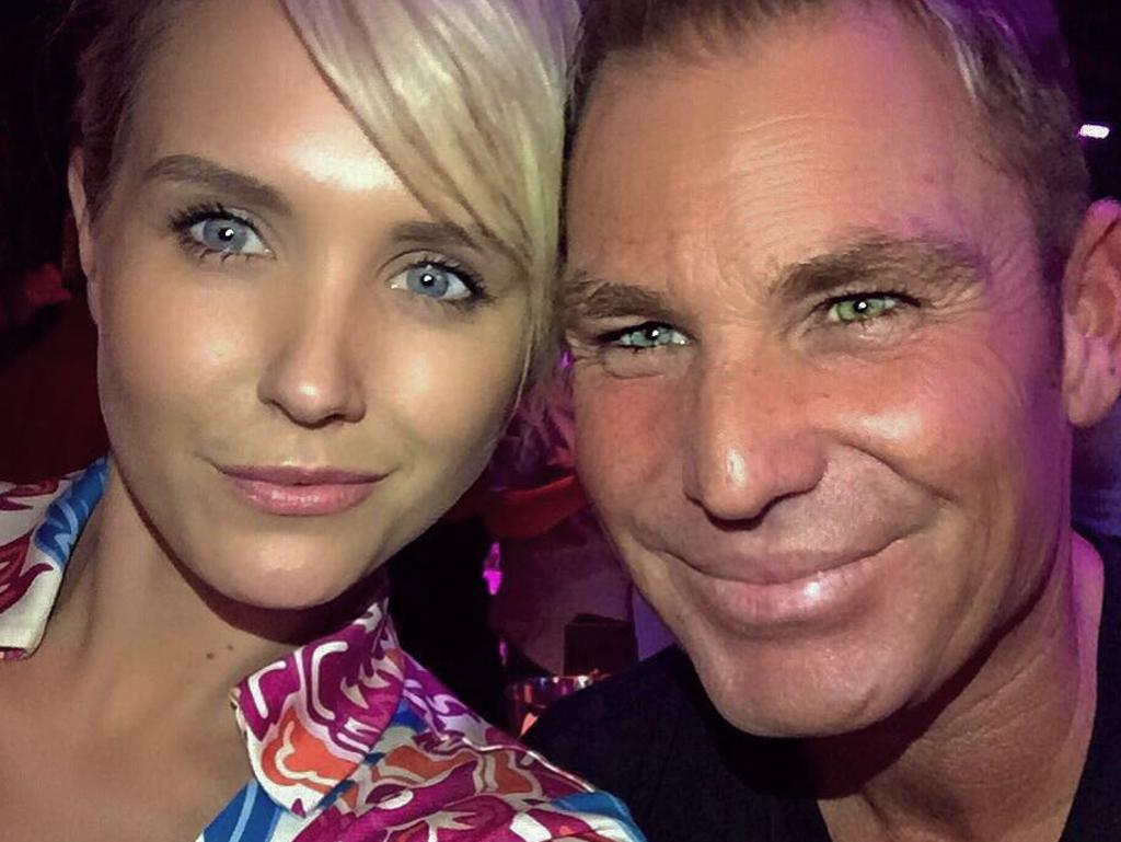 Shane Warne (pictured with Nicky Whelan in 2015) drastically altered the look of his face, and regretted it. Picture: Shane Warne/Instagram