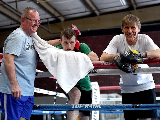 Jeff Horn and trainer Glenn Rushton (R) share a laugh during a training session. Pic: Getty