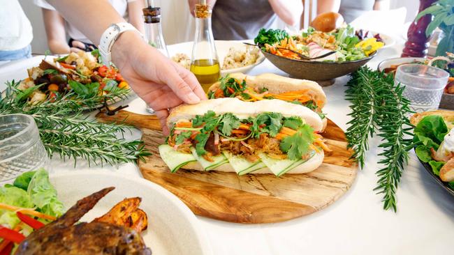 HEATING UP: Working alongside Toowoomba-based chef Ross Clark, the trio have created many recipes including Darling Fresh Smoke Haus pulled pork banh mi. Picture: Kat Lynn (Foodie shots).