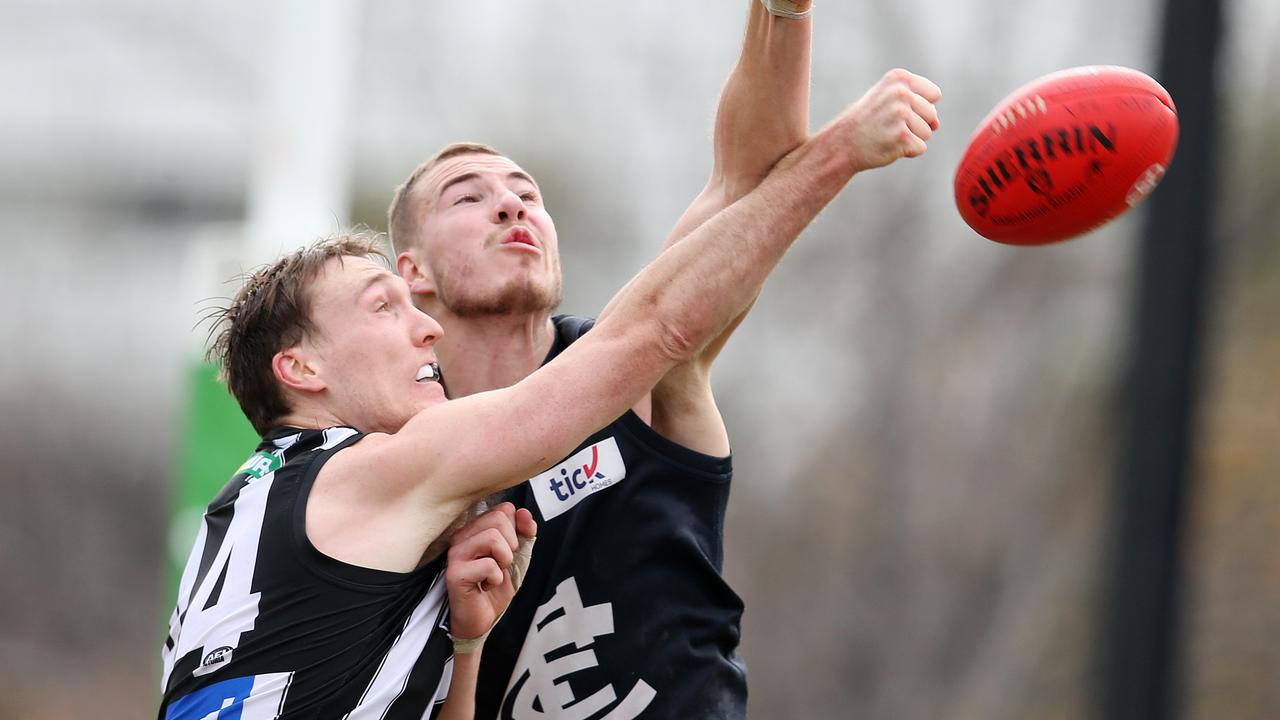 Collingwood’s Jack Madgen battles with Carlton’s Harry McKay. Photo: Michael Klein