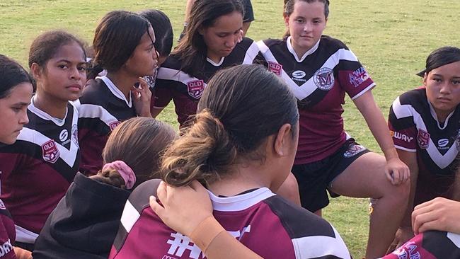 Janique Mili, left, with her teammates after winning.