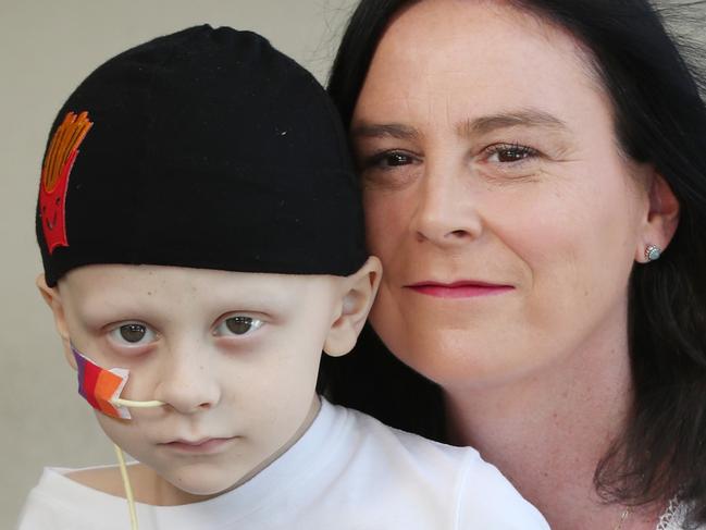 8-year-old Wakerley boy Richie Walsh was diagnosed with a rare cancer called Rhabdomyosarcoma. Mum n dad Karl and Lisa and son Luke 20yrs all Walsh. Pic Annette Dew