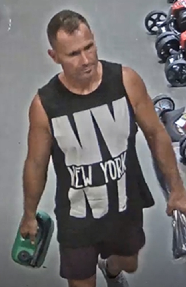 Rowan Baxter pictured on CCTV buying fuel cans and zip ties at Bunnings before the murders.