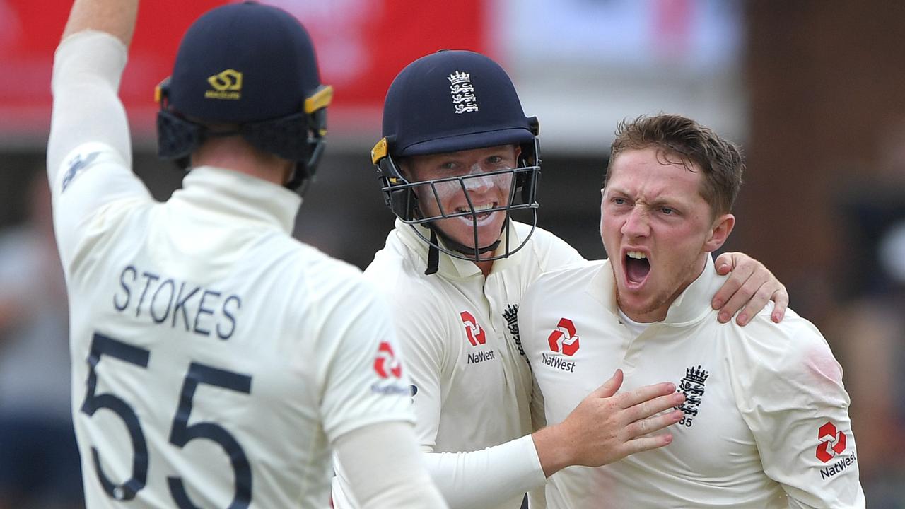 England bowler Dom Bess celebrates taking the wicket of Rassie van der Dussen.