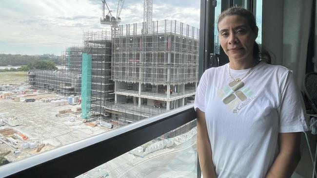 Heba Aly in her family apartment in October. It is across the road from the under-construction Wentworth Point High School.