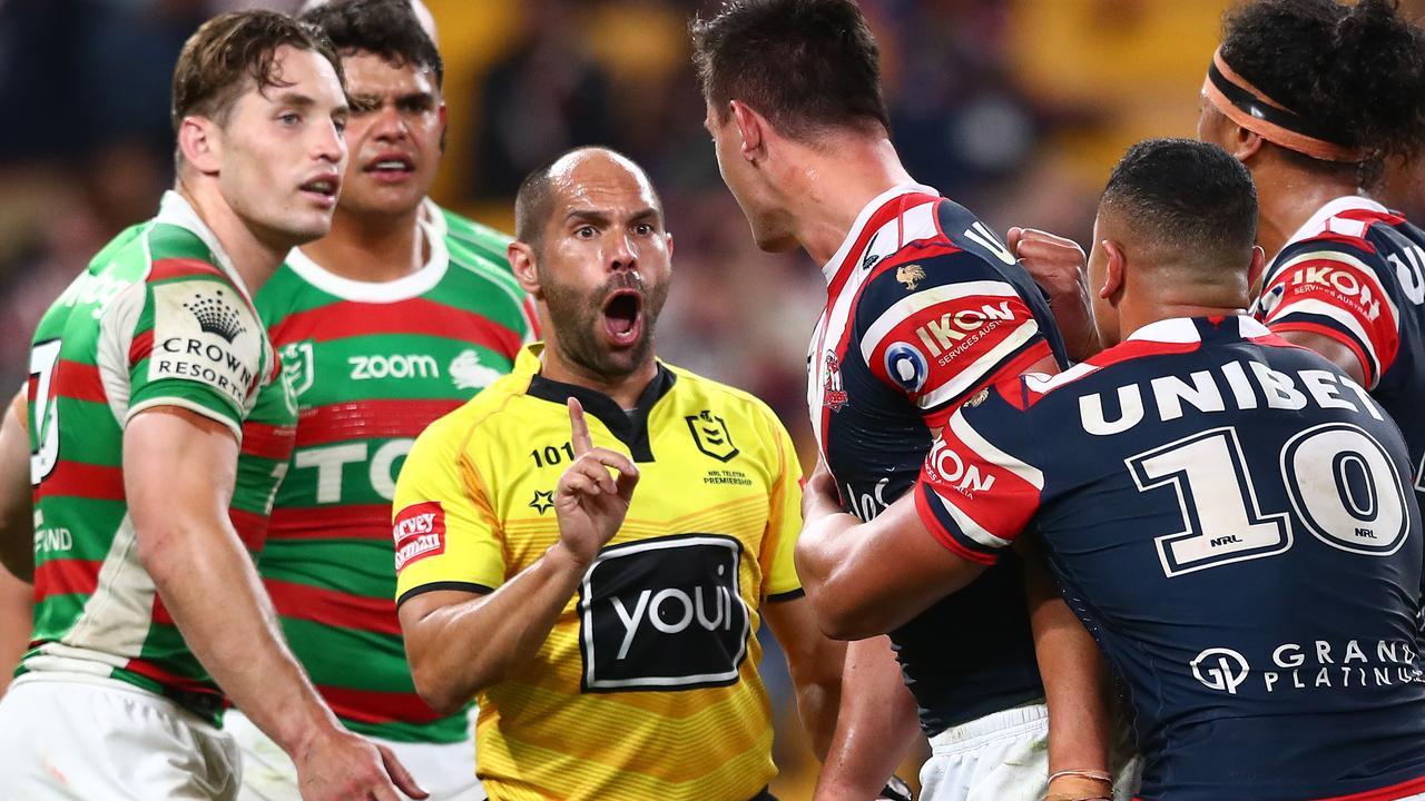Referee Ashley Klein speaks with Joseph Manu of the Roosters.