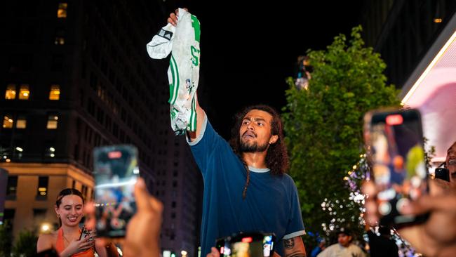 Fans rejoiced in eliminating the defending champion Celtics. (Photo by Angelina Katsanis/Getty Images)