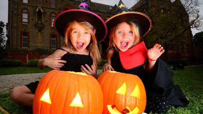 Halloween comes to Melbourne with Willow Smith, 6, and Anouk Smith, 4, and their pumpkins from Coles. Picture: Supplied