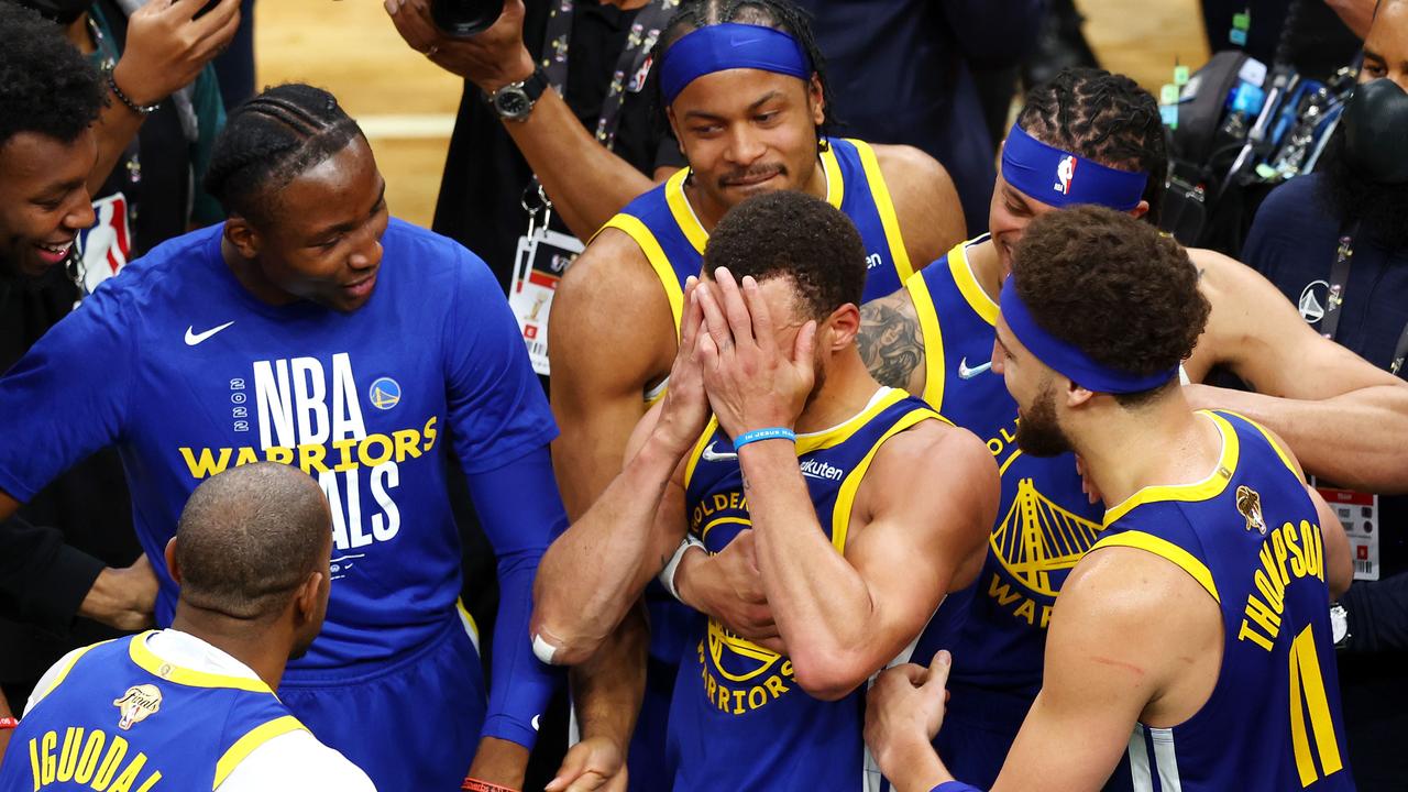 Steph Curry was overcome by emotion post-game. Adam Glanzman/Getty Images/AFP