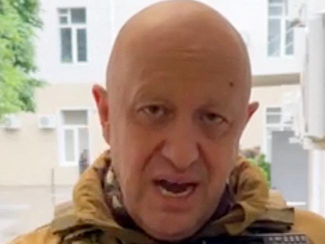 (FILES) This video grab taken from handout footage posted on June 24, 2023 on the Telegram account of the press service of Concord -- a company linked to the chief of Russian mercenary group Wagner, Yevgeny Prigozhin -- shows Yevgeny Prigozhin speaking inside the headquarters of the Russian southern military district in the city of Rostov-on-Don. Wagner chief Yevgeny Prigozhin is still in Russia, Belarus's president said on July 6, 2023, despite a deal with the Kremlin for him to move to Belarus following his failed insurrection last month. (Photo by Handout / TELEGRAM/ @concordgroup_official / AFP) / RESTRICTED TO EDITORIAL USE - MANDATORY CREDIT 
