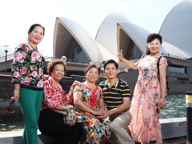 31/10/18: Chinese tourists L to R..MInwua Wu, Yunya Liu, Xiuwua Chen, Mengsheng Chen and Minying Wu at the Sydney Opera House John Feder/The Australian.