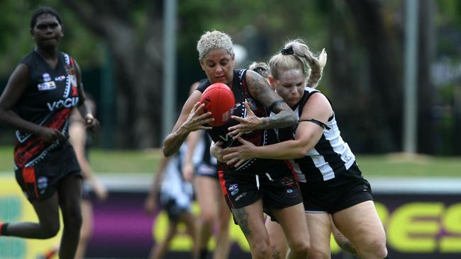 Bonnie McDougall tackles Skye Graham in round one of the NTFL 22/23 season. Picture: (A)manda Parkinson