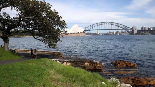 Mrs Macquarie's Chair and the nearby outdoor cinema have been added as venues to the NSW Health list. Picture: Toby Zerna