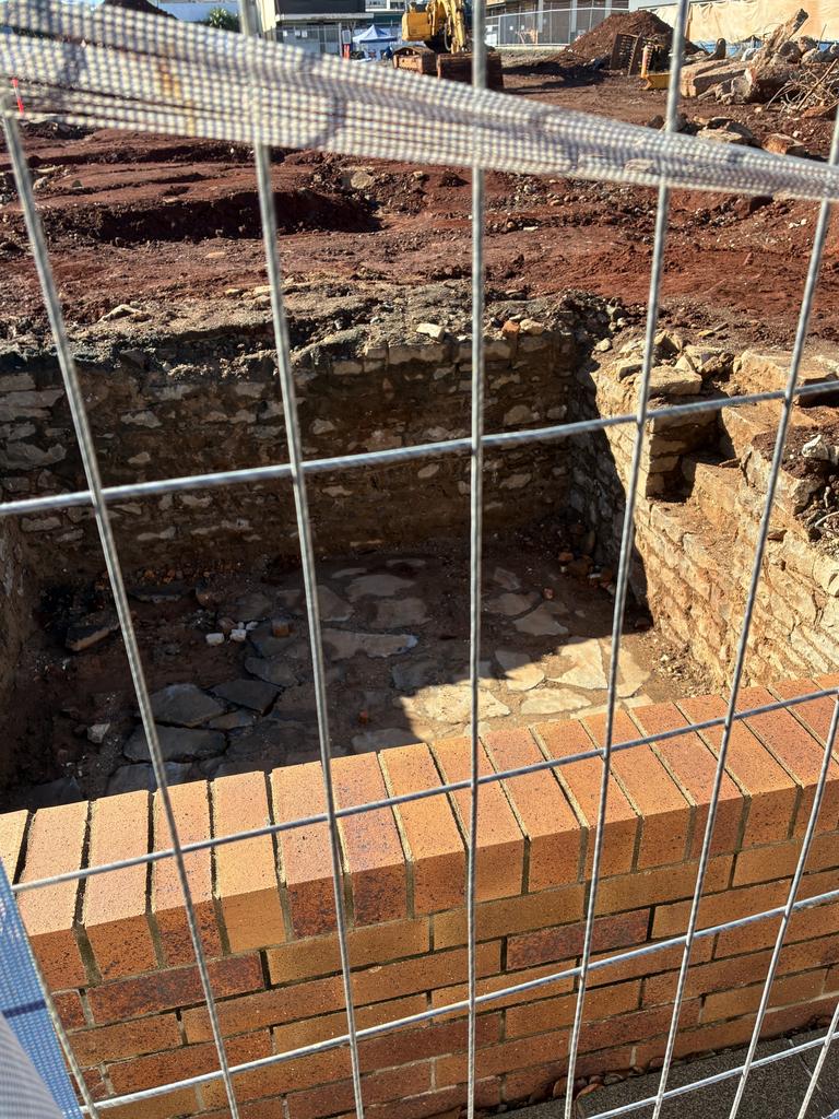 Demolition experts working on the site of the upcoming People First Bank headquarters on Ruthven Street in Toowoomba have discovered a stone cellar – the last remnants of what was once the Imperial Hotel.