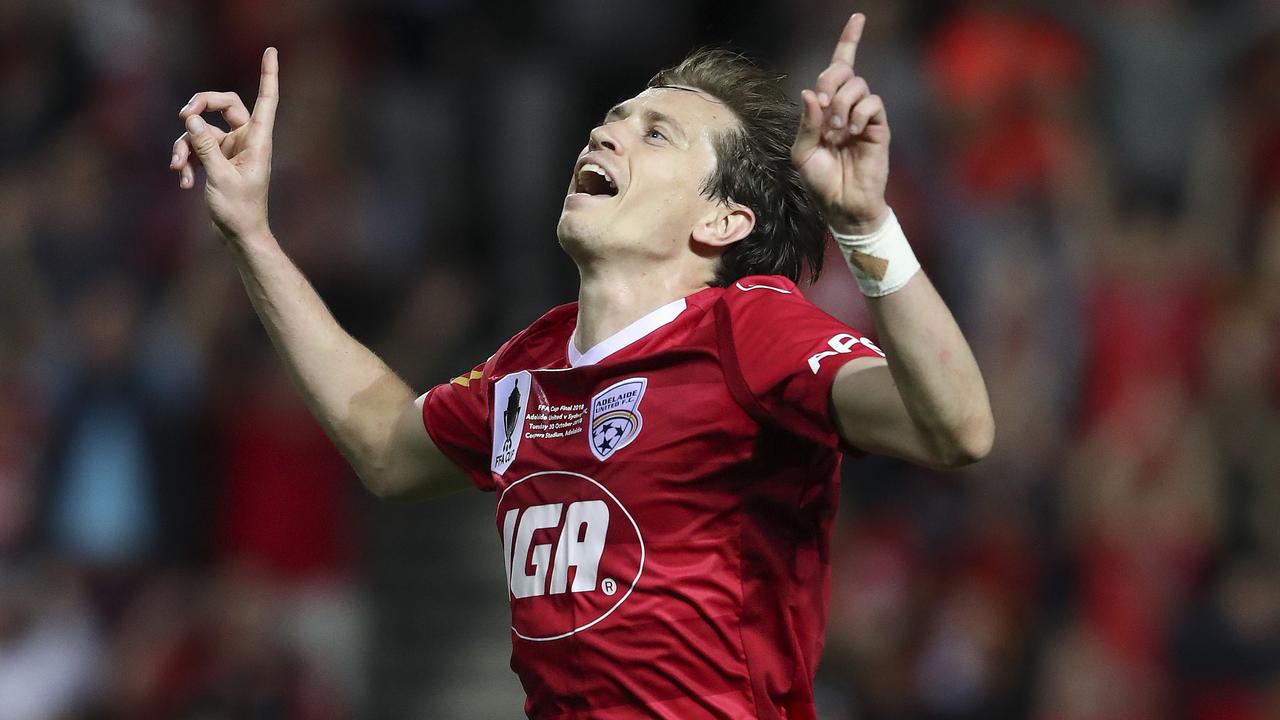 Craig Goodwin celebrates the second of his two stunning goals in the FFA Cup final.