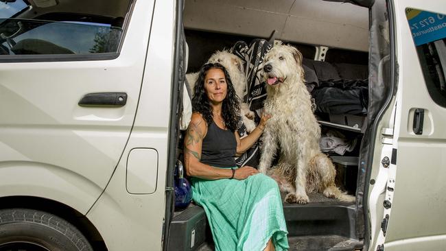 Amanda Allen escaped a domestic violence situation last year and after months sleeping in her car with her two dogs, Lobo and Ishka. Picture: Jerad Williams