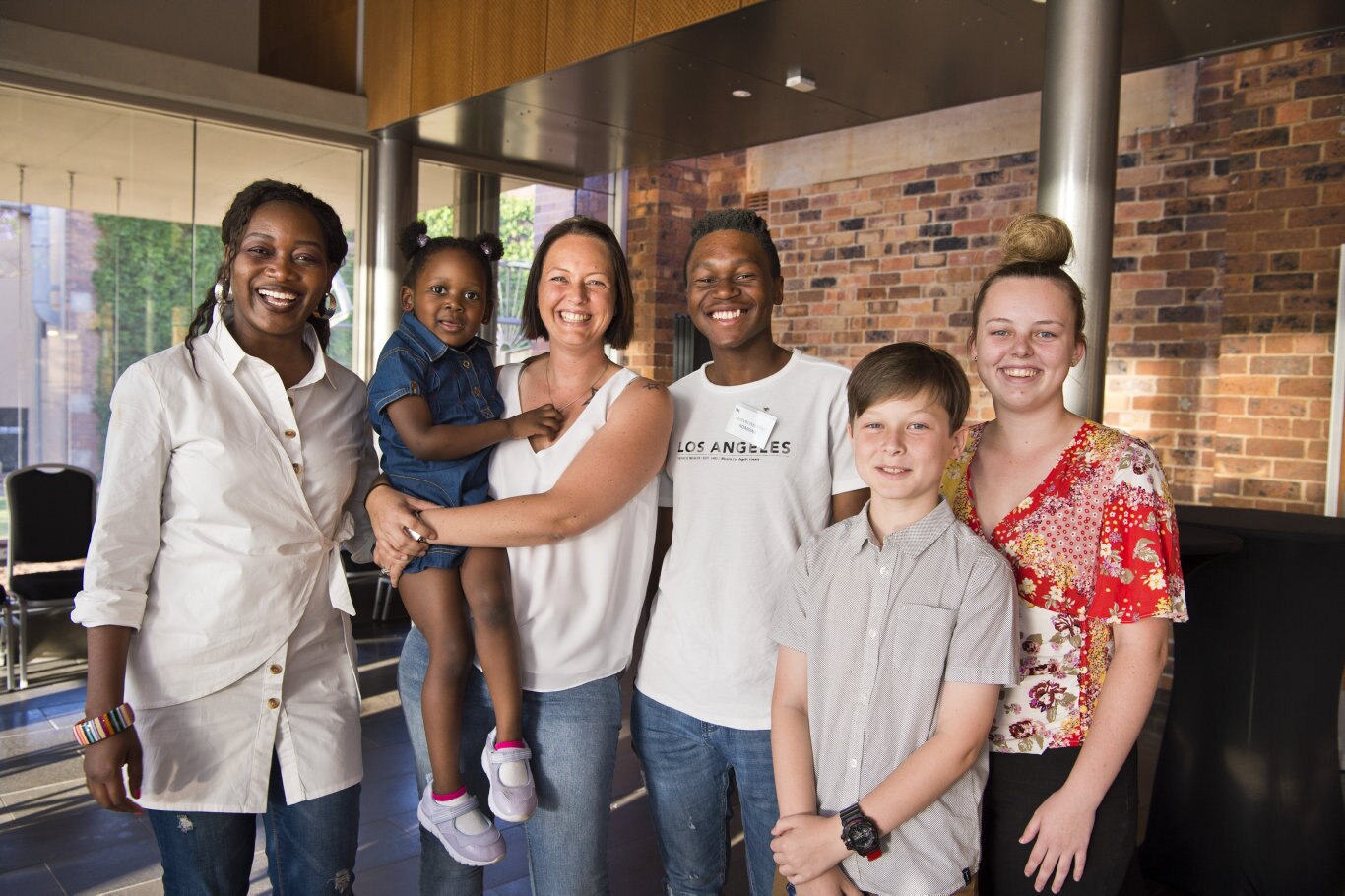 At the ceremony are (from left) Madalo Kachigamba, Lilli Salima being held by Jaymie Boddice, Marvin Ndasowa, Jaxon Hughes and Emily Holloway. Madola and Marvin are to be granted citizenship at the Toowoomba Regional Council Australian Citizenship Ceremony at The Annex, Friday, October 18, 2019. Picture: Kevin Farmer