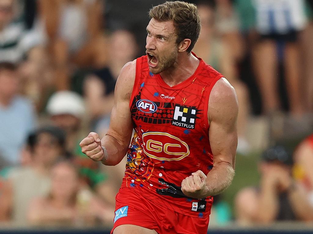Sam Day celebrates a goal during his 14-year stint at the Gold Coast Suns. Picture: Robert Cianflone/Getty Images