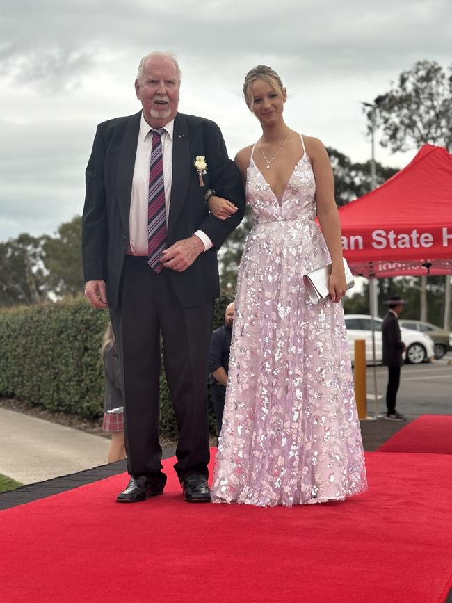 The students of Urangan State High School arriving at their formal.