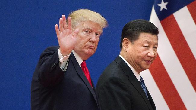 President Donald Trump in 2017 with China’s Xi Jinping at the Great Hall of the People in Beijing. Picture: AFP