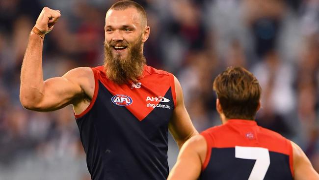 MELBOURNE, AUSTRALIA - APRIL 17: Max Gawn of the Demons celebrates after kicking a goal during the round four AFL match between the Collingwood Magpies and the Melbourne Demons at Melbourne Cricket Ground on April 17, 2016 in Melbourne, Australia. (Photo by Quinn Rooney/Getty Images)