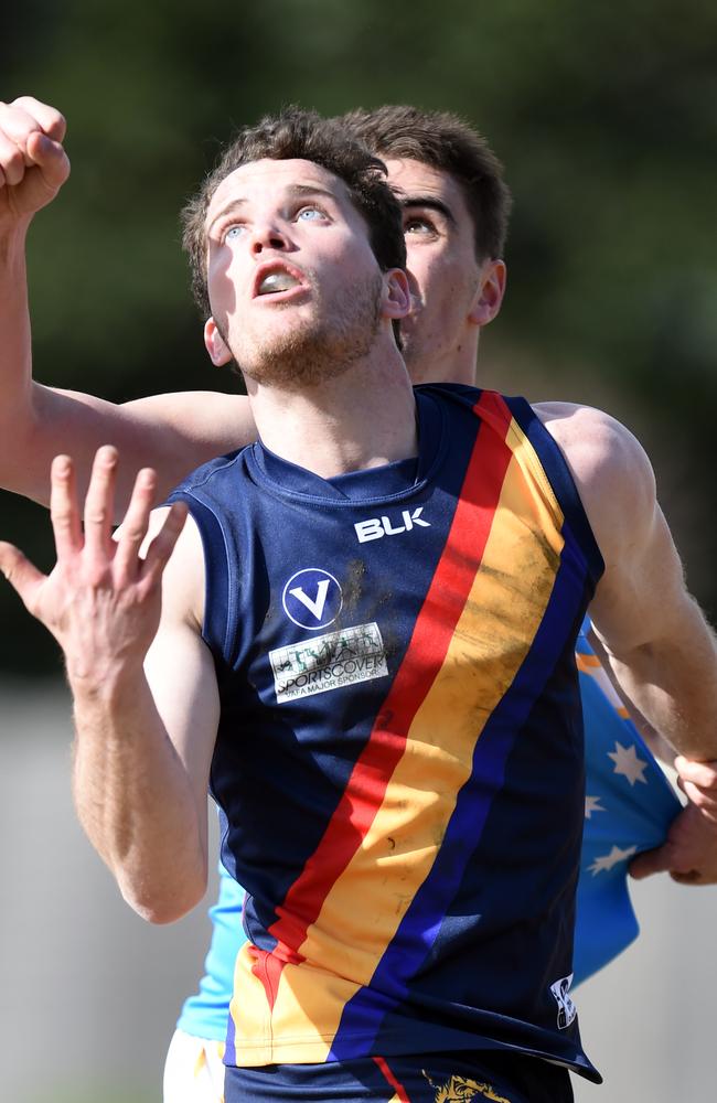 Michael Barnes eyes the high ball. Picture: Jason Sammon