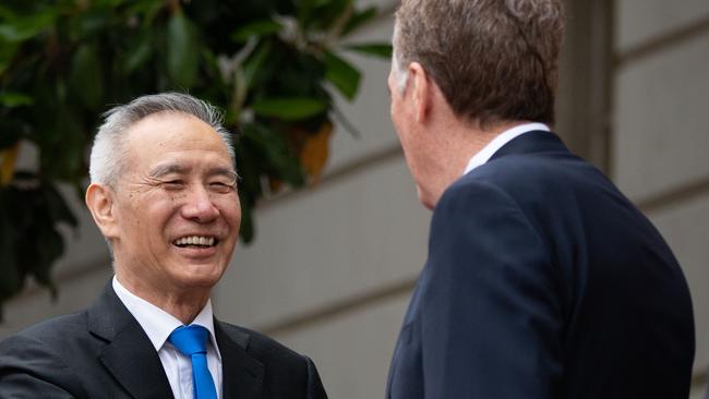 Chinese Vice Premier Liu He is greeted by Robert Lighthizer in Washington.  Pic: AFP