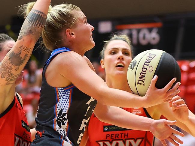 PERTH, AUSTRALIA - FEBRUARY 01: Shyla Heal of the Fire goes to the basket during the round 13 WNBL match between Perth Lynx and Townsville Fire at Bendat Basketball Stadium, on February 01, 2023, in Perth, Australia. (Photo by Paul Kane/Getty Images)