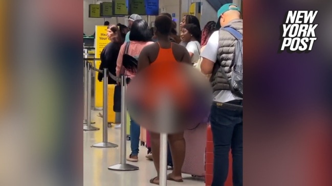 Seemingly Half Naked Woman Strolls Through Florida Airport This Aint