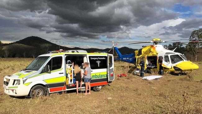 Paramedics attend the man at the Gympie region property before he was airlifted to hospital.