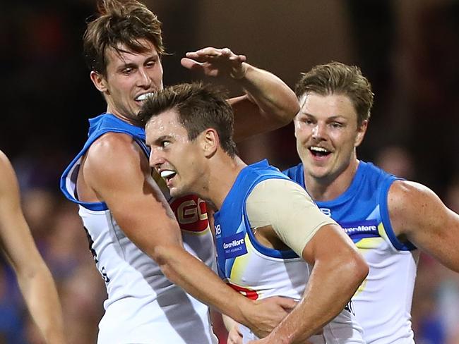 BRISBANE, AUSTRALIA - APRIL 22:  Jarryd Lyons of the Suns celebrates a goal during the round five AFL match between the Brisbane Lions and the Gold Coast Suns at The Gabba on April 22, 2018 in Brisbane, Australia.  (Photo by Chris Hyde/Getty Images)