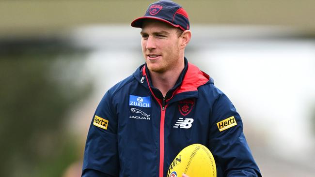 Harrison Petty looked on in a moon boot at Melbourne training on Tuesday. Picture: Quinn Rooney / Getty Images