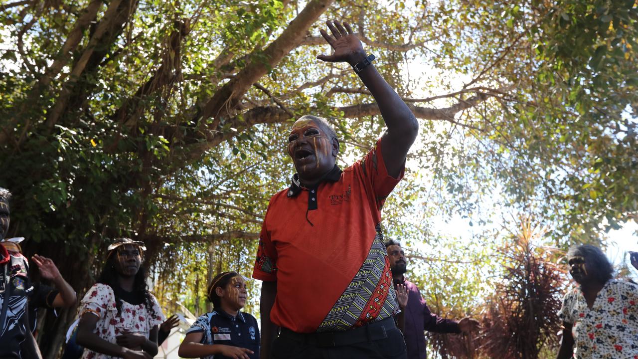 Senior Munupi man Mr Tungatulum leads family members in a performance of a Jorrigjorringa (kookaburra) song outside Darwin Local Court following the death in care coronial for 47-year-old Pukumani Alimankinni, on April 24, 2024. Picture: Zizi Averill