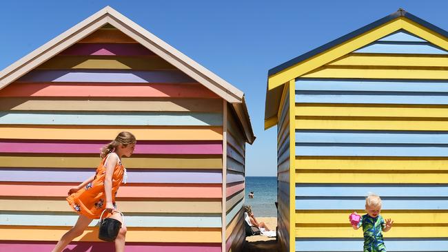 My Day on Instagram. Brighton Beach Boxes. Using bright colours in photos is fun and attracts the eye. Having the sun behind me meant the colour of the beach boxes and sky would be really bright. A large depth of field and fast shutter speed means the focal point, beach boxes and children are sharp. Picture: Josie Hayden