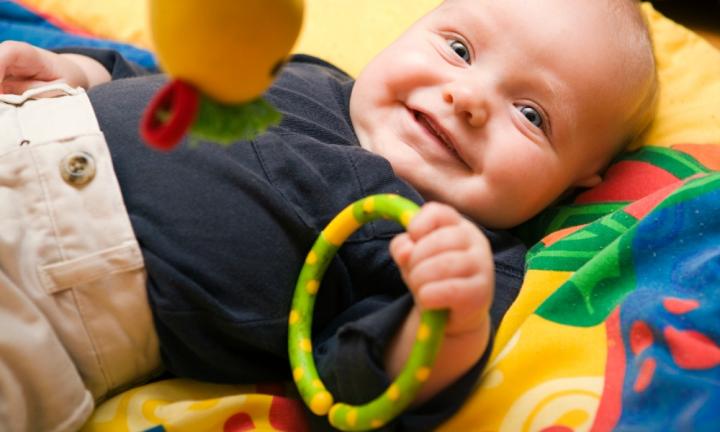 When Do Babies Start Playing With Toys? A Guide for 0-12 Months