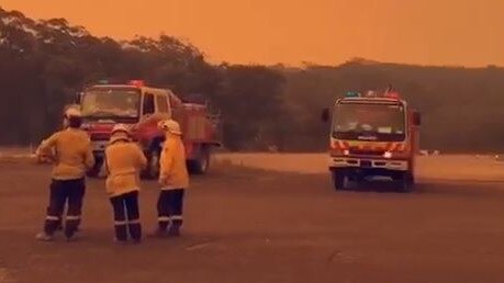 Fire crews at the scene of the Green Wattle Creek Fire which caused many residents in suburbs nearby a sleepless night on Thursday.