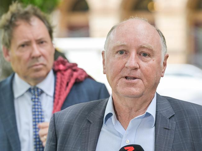 ADELAIDE, AUSTRALIA - NewsWire Photos NOVEMBER 9, 2022: Former Renewal SA boss John Hanlon, right, outside the District Court with his barrister David Edwardson KC after the DPP withdrew all charges against him. Picture: NCA NewsWire / Brenton Edwards