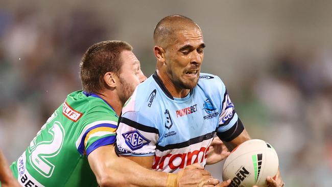 CANBERRA, AUSTRALIA - MARCH 19: William Kennedy of the Sharks is tackled during the round three NRL match between Canberra Raiders and Cronulla Sharks at GIO Stadium on March 19, 2023 in Canberra, Australia. (Photo by Mark Nolan/Getty Images)