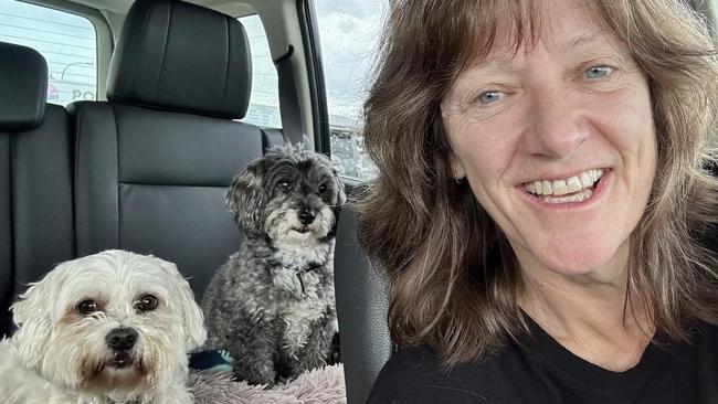 Jacqui Triggs, 59, with her beloved pooches Joey and Archie. Picture: Facebook