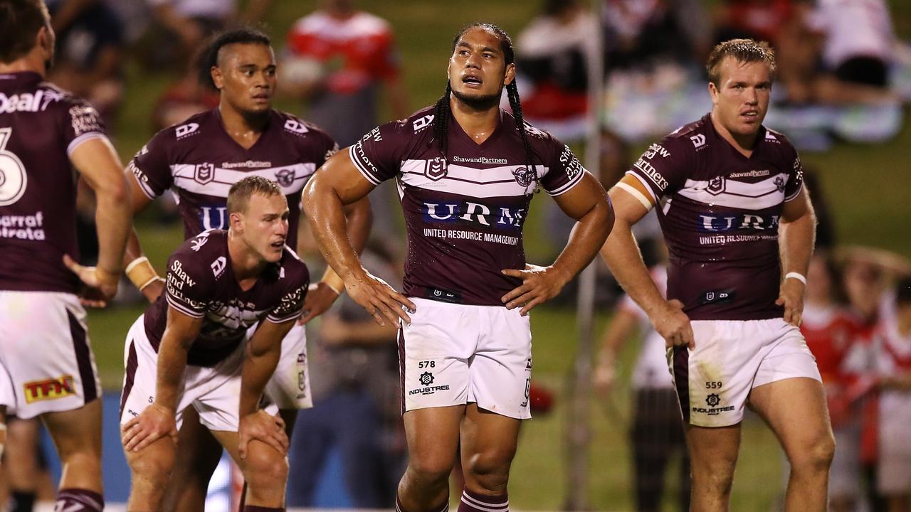 Daly Cherry-Evans, Martin Taupau and Jake Trbojevic dejected after Dragons score a try. Photo by Mark Kolbe/Getty Images