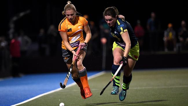 Morgan Gallagher in action against Tigers&gt; (AAP Image/Dan Peled)