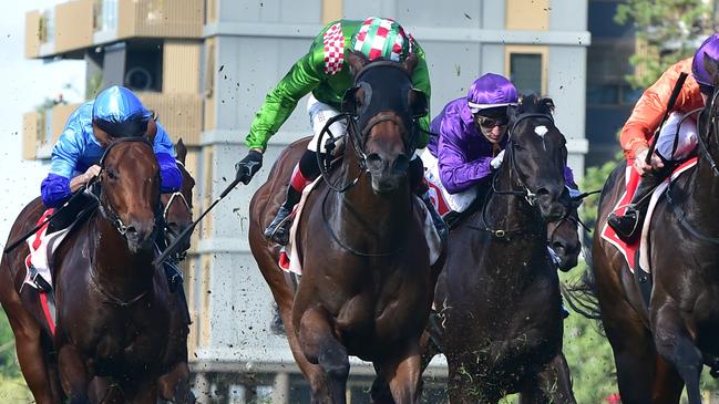 Talented colt Cool Archie (green colours) continued his winning streak in the Group 2 Spirit of Boom Classic at Doomben. Picture: Grant Peters/Trackside Photography