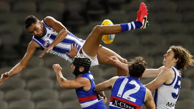 Tarryn Thomas flies above the pack before crashing hard down to Earth. Much like his Kangaroos did against the Bulldogs last weekend. Picture: Michael Willson/AFL Photos via Getty Images