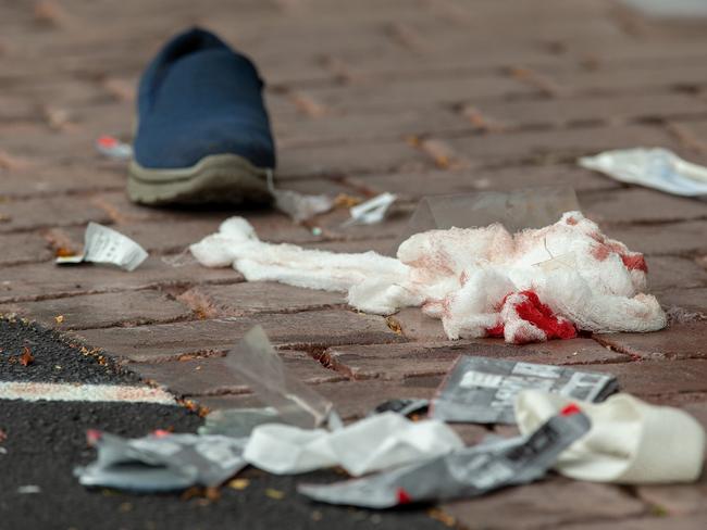 Bloodied bandages are seen on the road following a shooting at the Masjid Al Noor mosque in Christchurch. Picture: AAP