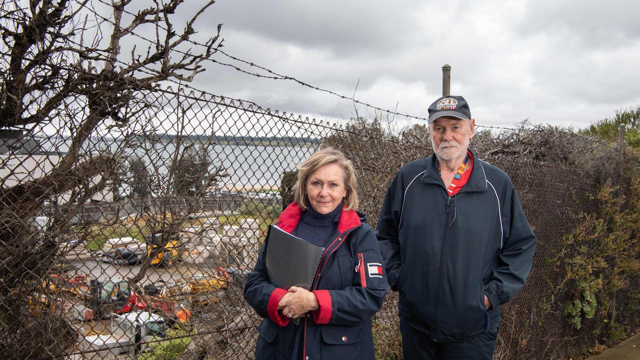 Rippleside residents Julie Hannan-Smith and Peter Jager in front of the stage 5 building siter of Balmoral Quay. Picture: Brad Fleet