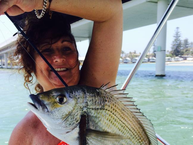 Michelle Bell, 48, of Freemans Reach, landed a 42cm bream that many locals believe is the biggest in living memory. Picture: supplied