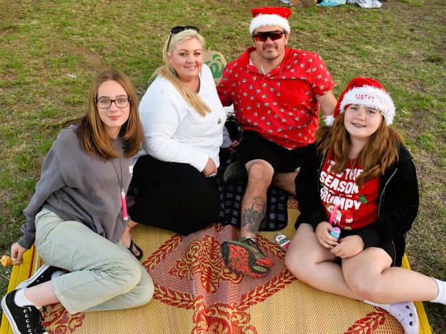 Monica, Cherie Watson, Geoff Watson and Nyharlia getting festive at the Phillip Island Christmas Carols by the Bay at the Cowes Foreshore on Tuesday, December 10, 2024. Picture: Jack Colantuono